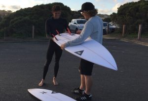 Adam Robertson in the Winkipop carpark checking out the 6'1 Simon Anderson Surfboard design